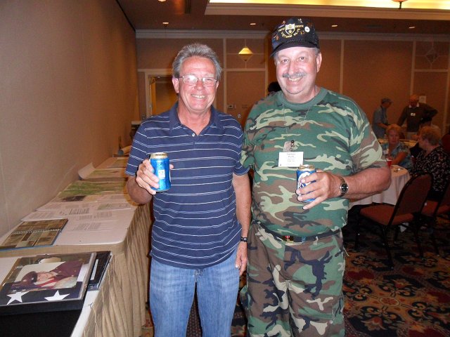 Jim Lally and Harless Belcher enjoying a bud  light